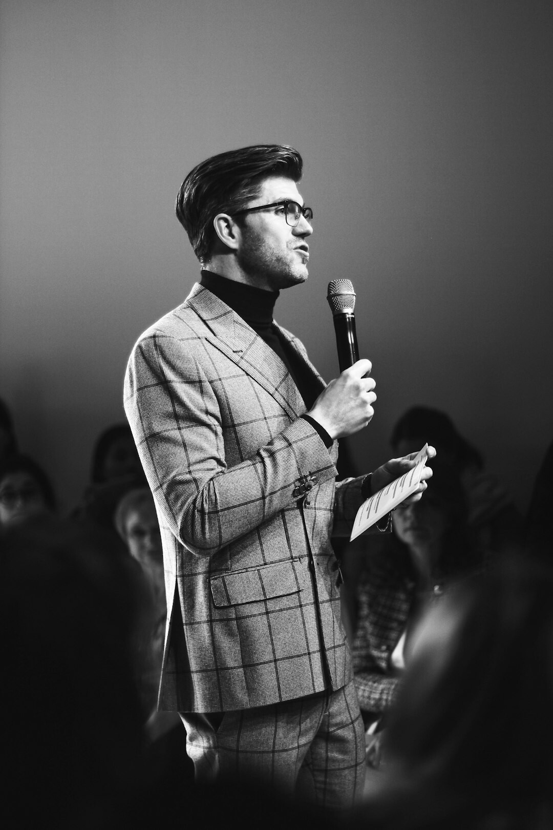 confident speaker addressing audience