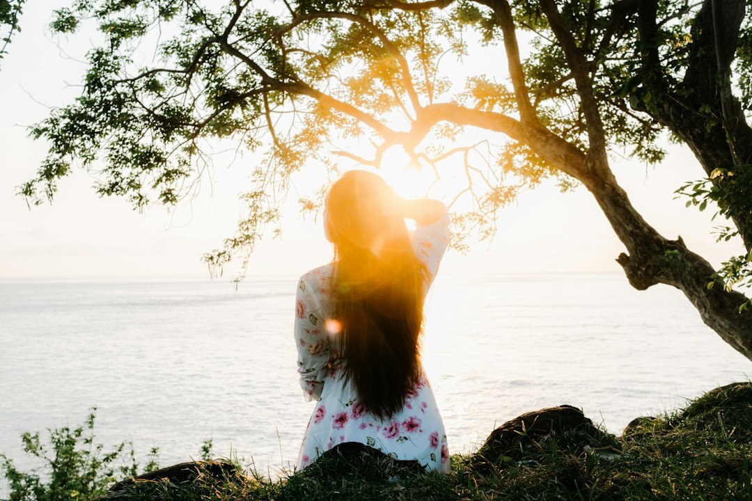 person reflecting alone in nature